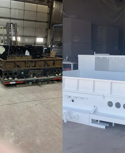 Large industrial equipment body shown in weathered and clean white finished condition