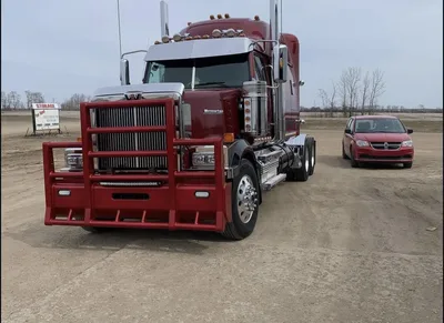Red semi truck fitted with matching red powder-coated heavy-duty front guard