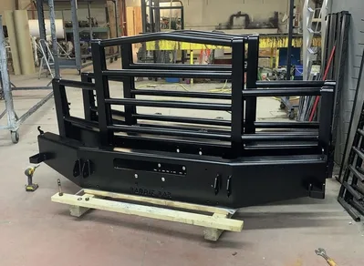 Large black powder-coated heavy-duty guard assembly photographed straight on